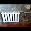 Установка чугунного радиатора.